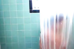 Brunette big beautiful woman washes her heavy bazookas in the shower