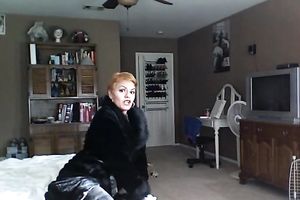 Full bodied redhead mamma poses for cam wearing petite bikini