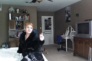 Full bodied redhead mamma poses for cam wearing petite bikini