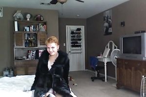 Full bodied redhead mamma poses for cam wearing petite bikini