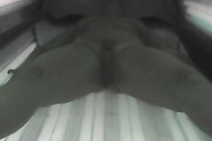 Sexy chick exposes her appetizing slit and her hot titties to the camera in solarium