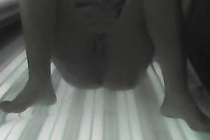 Sexy chick exposes her appetizing slit and her hot titties to the camera in solarium