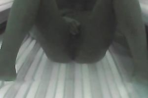 Sexy chick exposes her appetizing slit and her hot titties to the camera in solarium