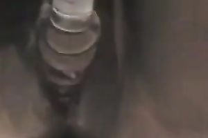 My ebon girlfriend copulates her dark soaked cum-hole with beaded glass toy