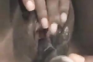 My ebon girlfriend copulates her dark soaked cum-hole with beaded glass toy