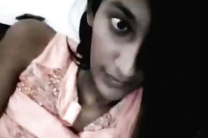 Webcam solo with an Indian sweetheart flashing her milk shakes