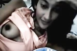 Webcam solo with an Indian sweetheart flashing her milk shakes