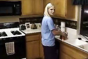 Cute blond girl gives her hubby oral-job in kitchen