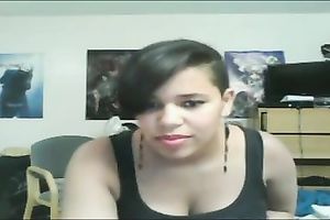 Chunky short-haired whore shows her large pantoons and hairless vagina