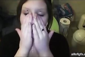 Chubby dilettante dark brown eats the cum which that babe receives on her face