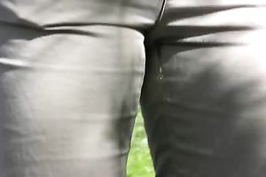 Crazy blond Irina pees her panties in the street in solo movie