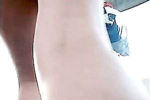 Upskirt outdoor scene with a cute honey wearing a miniskirt