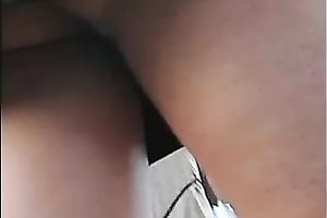 Upskirt outdoor scene with a cute honey wearing a miniskirt