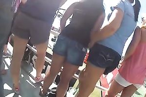 Hunting for sexy female asses at the beach with hidden camera