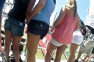 Hunting for sexy female asses at the beach with hidden camera