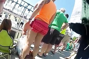 Hunting for sexy female asses at the beach with hidden camera