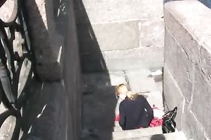 Lena pees in her panties and changes her wet clothing on the stairs