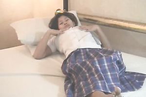 Nice Asian nympho is enjoying herself in the bedroom