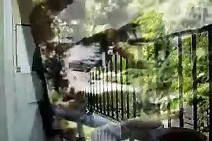 Watch me fucking my co-worker's pussy on the balcony
