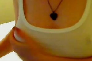 Wonderfully sexy camgirl is playing with her large boobies