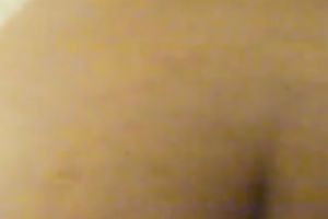 My horny hotwife entertains herself by fingering her shaved cunt