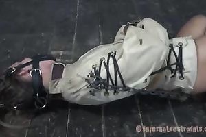 Brunette beauty bounded with straitjacket is willing to be tortured