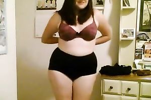 Chubby geek honey receives nude in her room and caresses her obese body