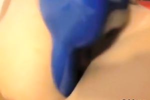 Hot blooded dark brown sex doll masturbates ardently on sofa