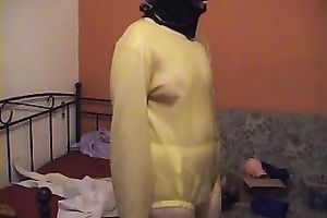 I aid my dirty slut wife to put a latex straitjacket on and tie her up