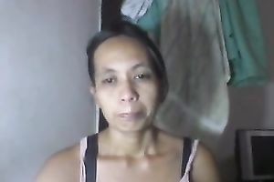 Super bosomy Filipina mamma undresses and boasts of her large naturals