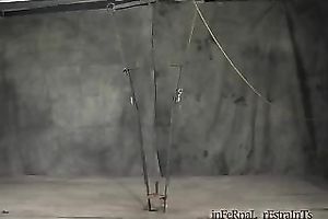 Redhead doxy acquires her scones and legs squeezed in BDSM video