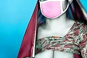 Mysterious Indian woman shows off her large moist titties