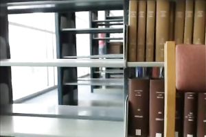 Desirable golden-haired gal flashes her constricted body in a public library