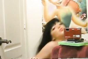 Cute dark brown boasts of her fantastic natural marangos in homemade solo