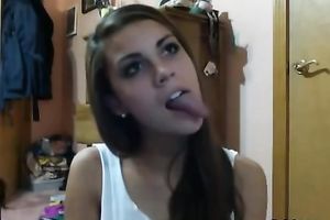 Hypnotically hawt legal age teenager is proudly showing off her lengthy tongue