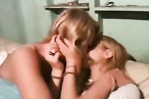 Three playful lesbos kiss and tease every other passionately