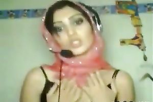 Seductive Indian hooker is posing for cam wearing tempting dark lacy brassiere