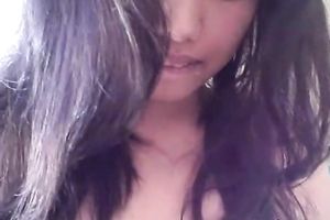 Chinese nympho with charming eyes gives her paramour a fine oral pleasure