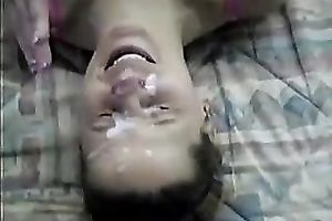Beautiful dilettante golden-haired girlfriend receives a sticky cum on her face