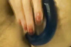 My chubby white women enjoys having a lengthy fake penis in her bumhole