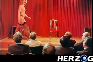 Blonde milf wench widens her legs for three dudes on the chair