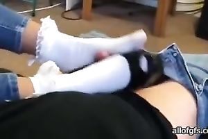 Girl wearing white socks favours a stud with a footjob
