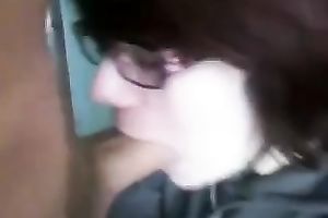 Dark-haired fuckbuddy in glasses sucks my obese prick in POV movie scene