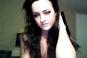 Curly haired beauty with tasty boobs is finger banging her fuckhole