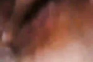 My Asian bedmate fingers her curly crotch to orgasm