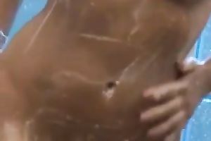 My fleshly GF strokes her big fake love muffins during the time that taking a shower