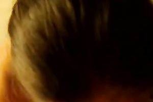 Giving him a valuable head after riding his large dong in reverse cowgirl style