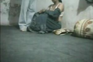 Spy camera catches cheesy Indian hooker exposed in the room