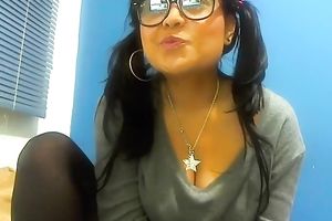 Young and large boobed dark brown undresses in front of the camera