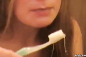 Cum longing nympho brushes her teeth with her lover's cock juice